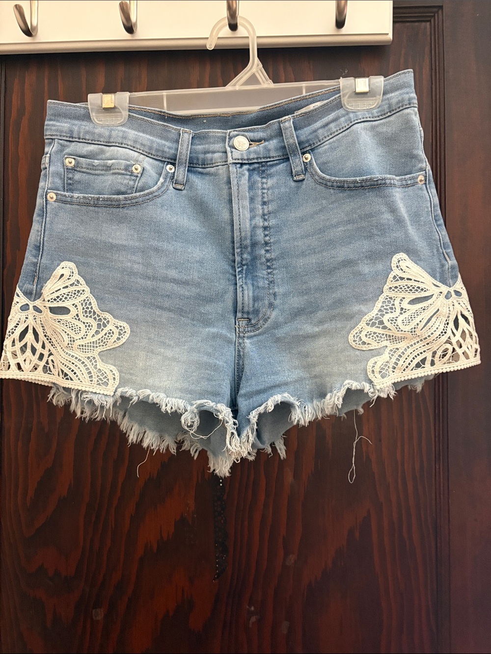 Light Blue Denim Shorts with White Lace Trim